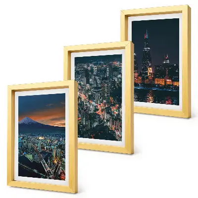 Trittico incorniciato vista notturna della città dalle montagne con grattacieli sullo sfondo