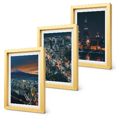 Trittico incorniciato Vista notturna della città dalle montagne, con i grattacieli sullo sfondo.