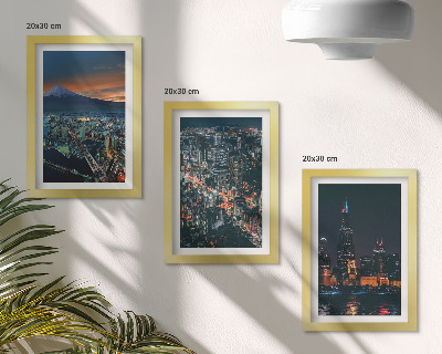 Trittico incorniciato Vista notturna della città dalle montagne, con i grattacieli sullo sfondo.