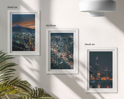 Trittico incorniciato Vista notturna della città dalle montagne, con i grattacieli sullo sfondo.