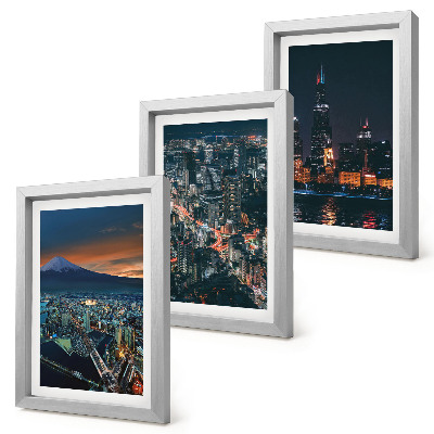 Trittico incorniciato Vista notturna della città dalle montagne, con i grattacieli sullo sfondo.