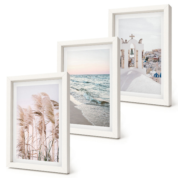 Trittico incorniciato Piante costiere, onde del mare, vista di case bianche