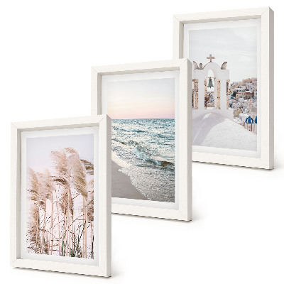 Trittico incorniciato Piante costiere, onde del mare, vista di case bianche