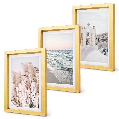 Trittico incorniciato Piante costiere, onde del mare, vista di case bianche
