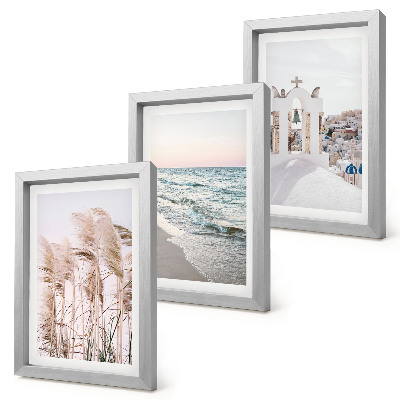 Trittico incorniciato Piante costiere, onde del mare, vista di case bianche