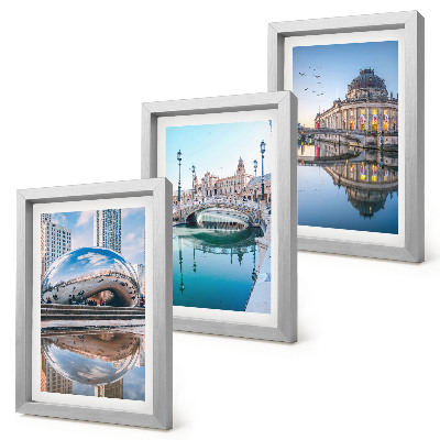 Composizione di 3 quadri L'architettura della città riflessa nell'acqua