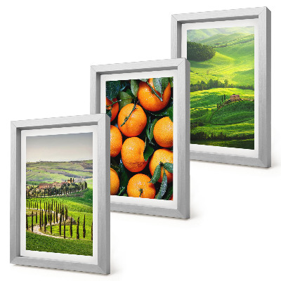 Trittico incorniciato Paesaggio rurale italiano con arance e natura