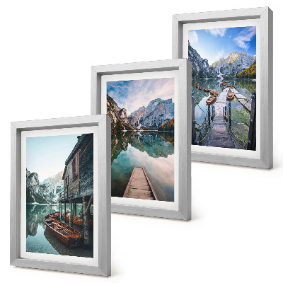 Composizione di 3 quadri Un tranquillo lago di montagna con barche di legno