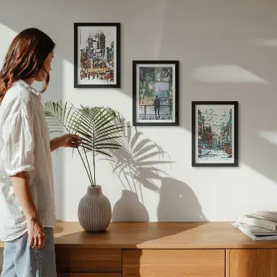 Trittico incorniciato città moderne a colori con figura sullo sfondo