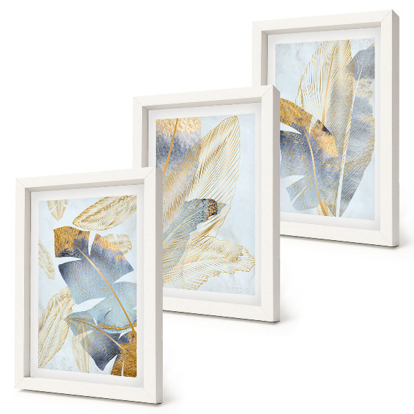Composizione di 3 quadri Foglie nelle tonalità del blu e del beige su uno sfondo chiaro.