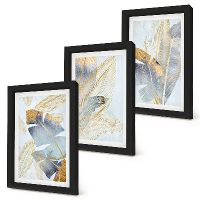 Composizione di 3 quadri Foglie nelle tonalità del blu e del beige su uno sfondo chiaro.
