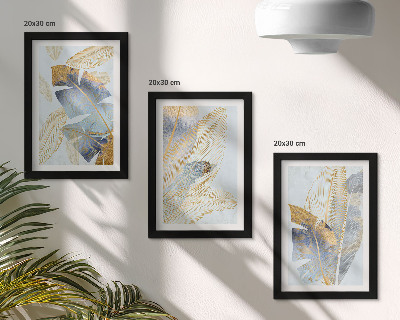Composizione di 3 quadri Foglie nelle tonalità del blu e del beige su uno sfondo chiaro.
