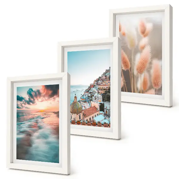 Composizione di 3 quadri con vista mare al tramonto, case colorate e fiori