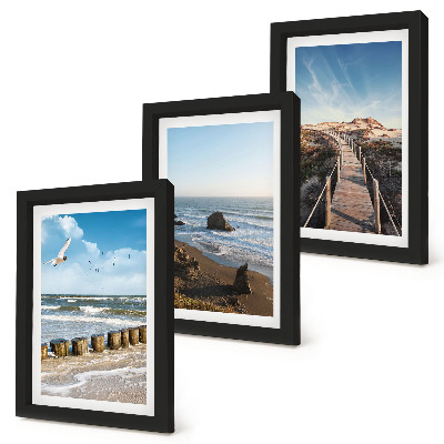 Composizione di 3 quadri Vista della spiaggia con onde, cielo e un pontile pedonale.