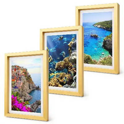 Trittico incorniciato panorami marini con case colorate e barriera corallina