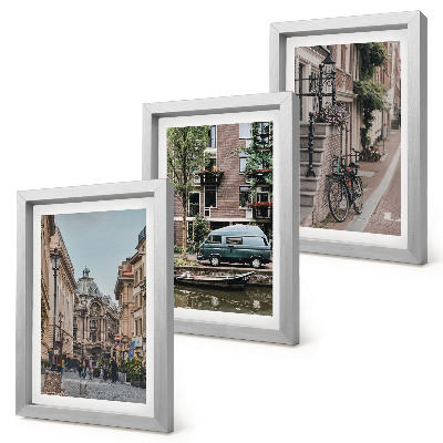 Composizione di 3 quadri Tranquille vedute cittadine di edifici