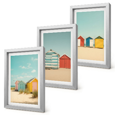 Trittico incorniciato Case colorate sulla spiaggia in una giornata di sole