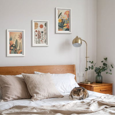 Composizione di 3 quadri Fantasie floreali in stile boho dai toni caldi e dall'aspetto naturale.