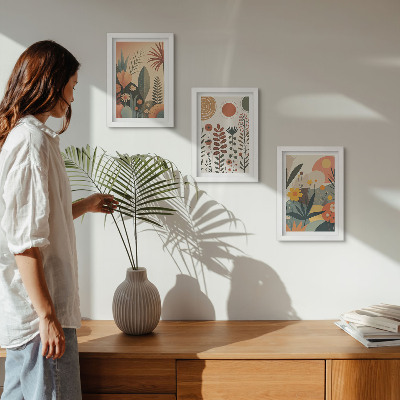 Composizione di 3 quadri Fantasie floreali in stile boho dai toni caldi e dall'aspetto naturale.