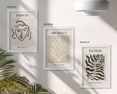 Composizione di 3 quadri Illustrazioni di volti e foglie tratte dalle opere grafiche di Henri Matisse.