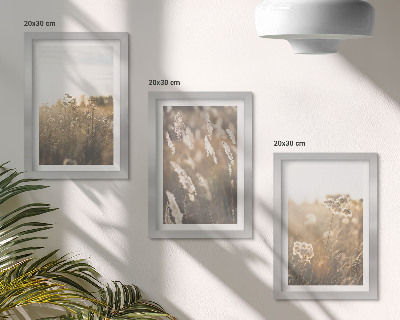 Composizione di 3 quadri Un paesaggio con erbe e fiori dalle tonalità calde