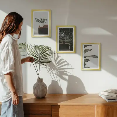 Piante in vaso con foglie rustiche composizione di 3 quadri