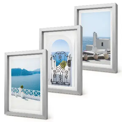 Trittico incorniciato vista sul mare con edifici bianchi in Grecia