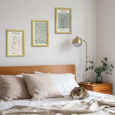Composizione di 3 quadri con linee e motivi vegetali in stile minimalista