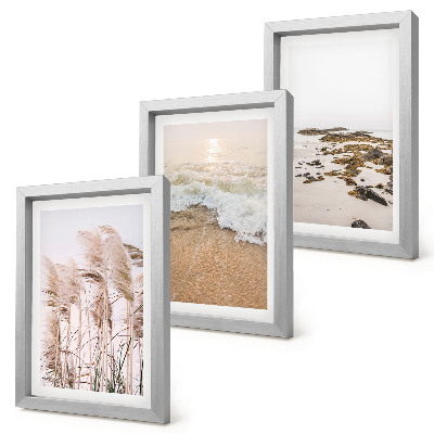 Trittico incorniciato Onde d'erba sulla spiaggia e pietre in riva al mare, stile boho