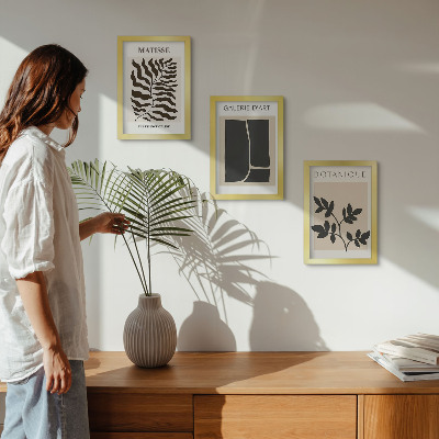 Composizione di 3 quadri Poster minimalisti con motivi vegetali e astratti.