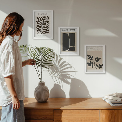 Composizione di 3 quadri Poster minimalisti con motivi vegetali e astratti.