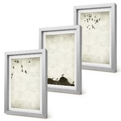 Composizione di 3 quadri stormo di uccelli in volo in stile minimalista