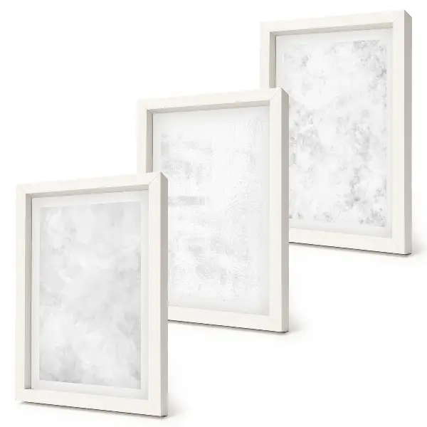 Trittico incorniciato con macchie bianche su tela dal design minimalista