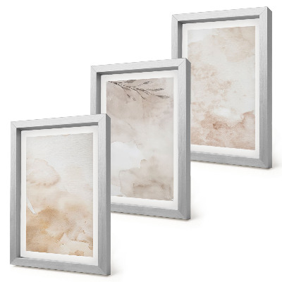 Composizione di 3 quadri Macchie e foglie ad acquerello dai colori pastello.