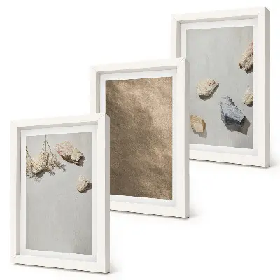 Trittico incorniciato pietre da spiaggia con strutture naturali