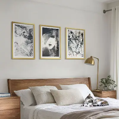 Set di 3 quadri con motivi astratti in bianco e nero