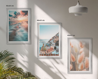 Set di quadri incorniciati tramonto sul mare case fiori