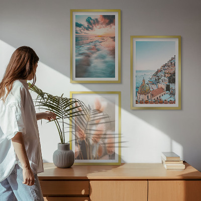 Set di quadri incorniciati tramonto sul mare case fiori