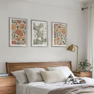Set di 3 quadri con motivi floreali arancione e verde