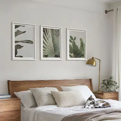 Set di 3 quadri con foglie di piante tropicali color pastello