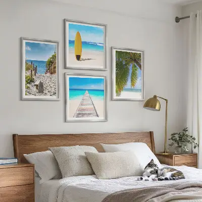 Composizione di 4 quadri con soggetti paesaggistici di spiagge e palme