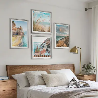 Composizione di 4 quadri con paesaggi di spiagge città e scogliere