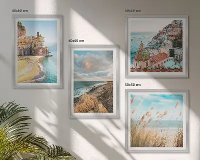 Composizione di 4 quadri con paesaggi di spiagge città e scogliere