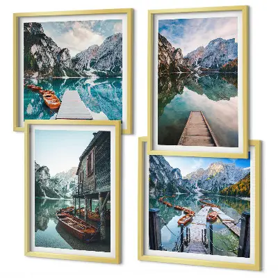Galleria a parete lago con montagne e barche di legno