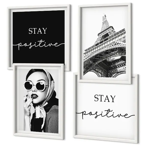 Galleria a parete con ritratti della Torre Eiffel e slogan