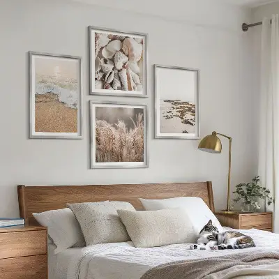 Composizione di 4 quadri decorazione da parete con spiaggia ed erba tra onde e pietre in stile boho