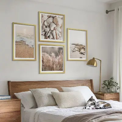 Composizione di 4 quadri decorazione da parete con spiaggia ed erba tra onde e pietre in stile boho