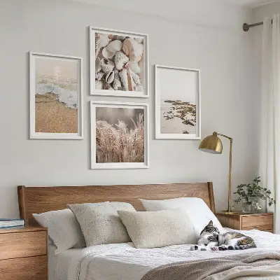 Composizione di 4 quadri decorazione da parete con spiaggia ed erba tra onde e pietre in stile boho
