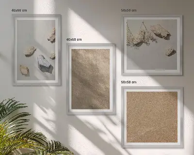 Composizione di 4 quadri con pietre da spiaggia e strutture naturali
