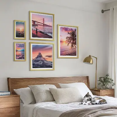 Set di quadri incorniciati con paesaggi marini e palme